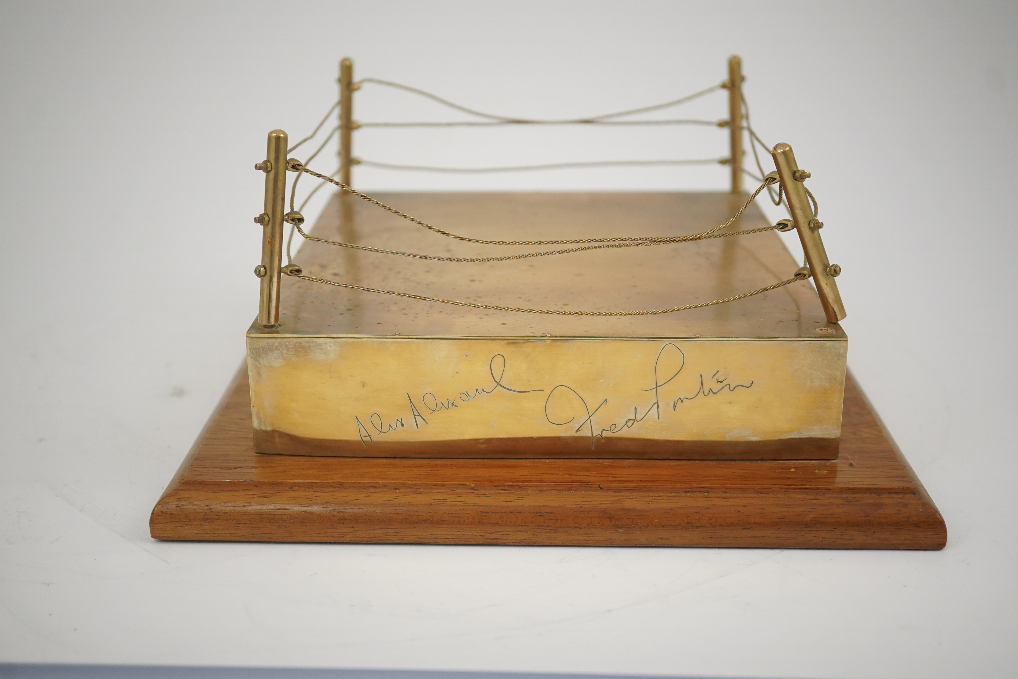 A late 1960's 9ct gold mounted Golden Wedding gift, presented to Jack & Fay Solomons from the Directors of World Sporting Club, modelled as a boxing ring